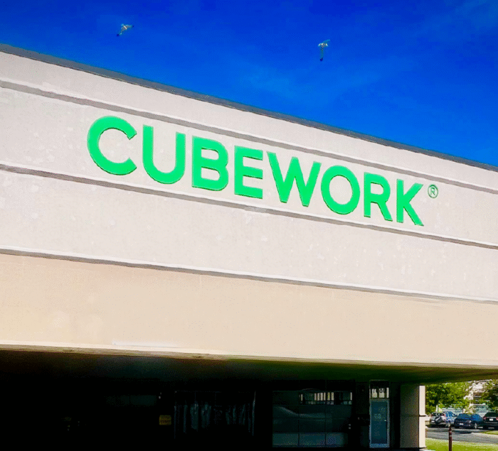 Custom acrylic office sign for Cubework designed by SignFreaks.