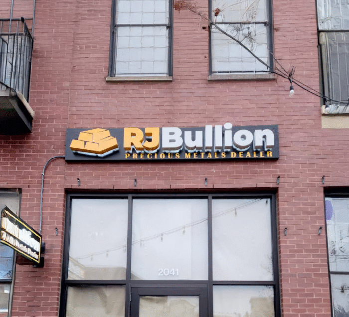 CNC router signs for RJ Bullion, a U.S. precious metals dealer, designed and installed by SignFreaks.