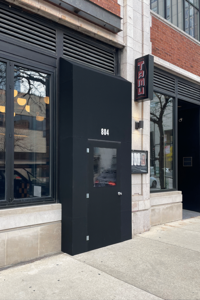 Vestibule for TAMU Chicago by SignFreaks, improving restaurant entrance design.